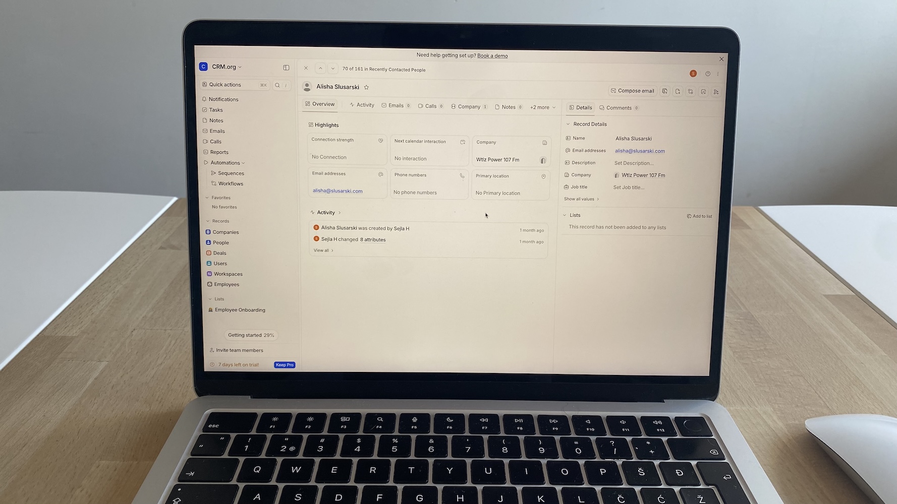 Contact record in Attio includes details like email, company name, and recent activity timeline.