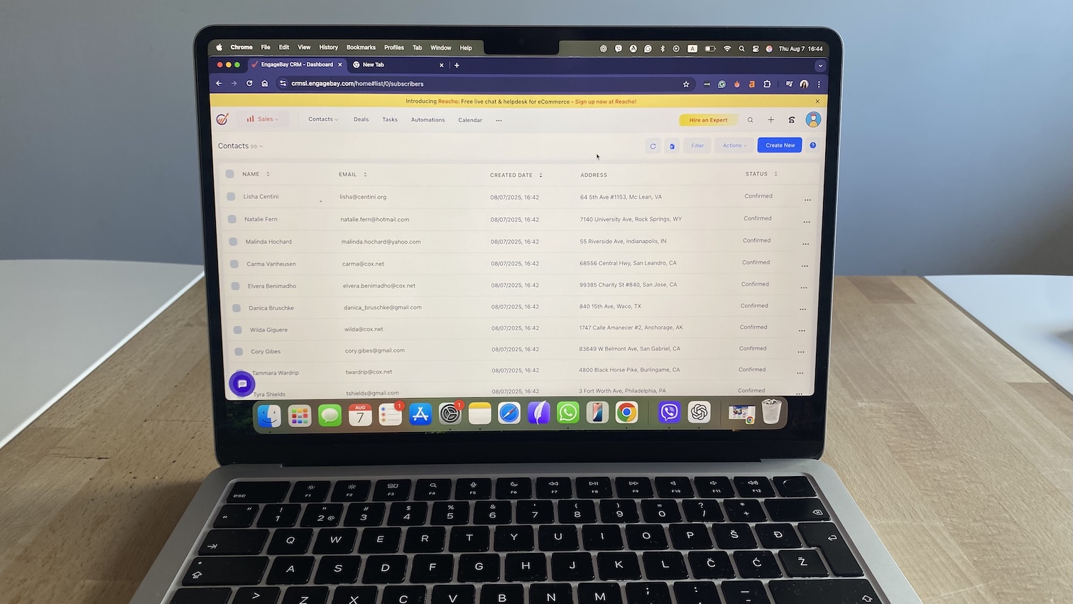 EngageBay CRM showing contact list with subscriber details and statuses