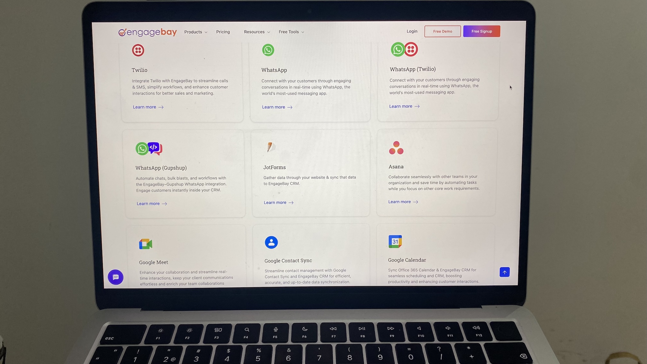 EngageBay integrations overview with options for WhatsApp, Twilio, Asana, Google tools, and more.