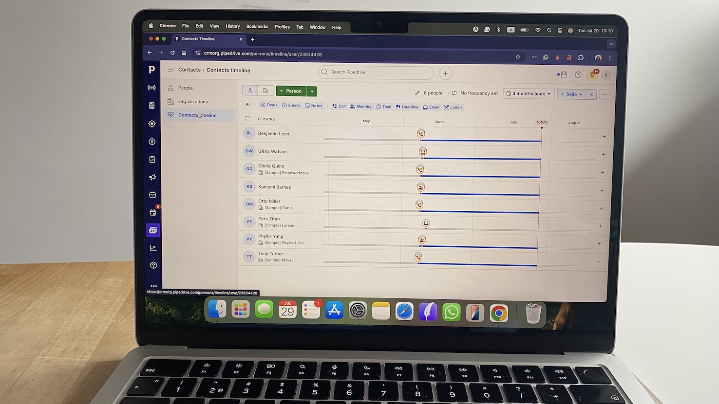 Pipedrive contacts timeline view showing outreach history by person, with icons for calls, emails, tasks, and meetings.