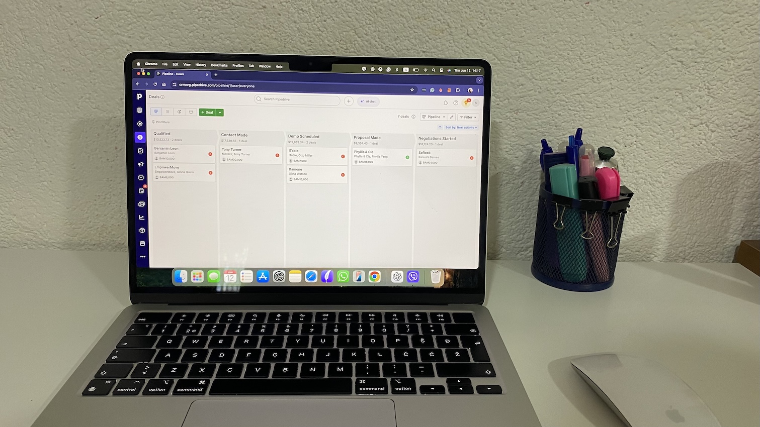 Pipedrive CRM deals pipeline view with stages from qualified to negotiations started