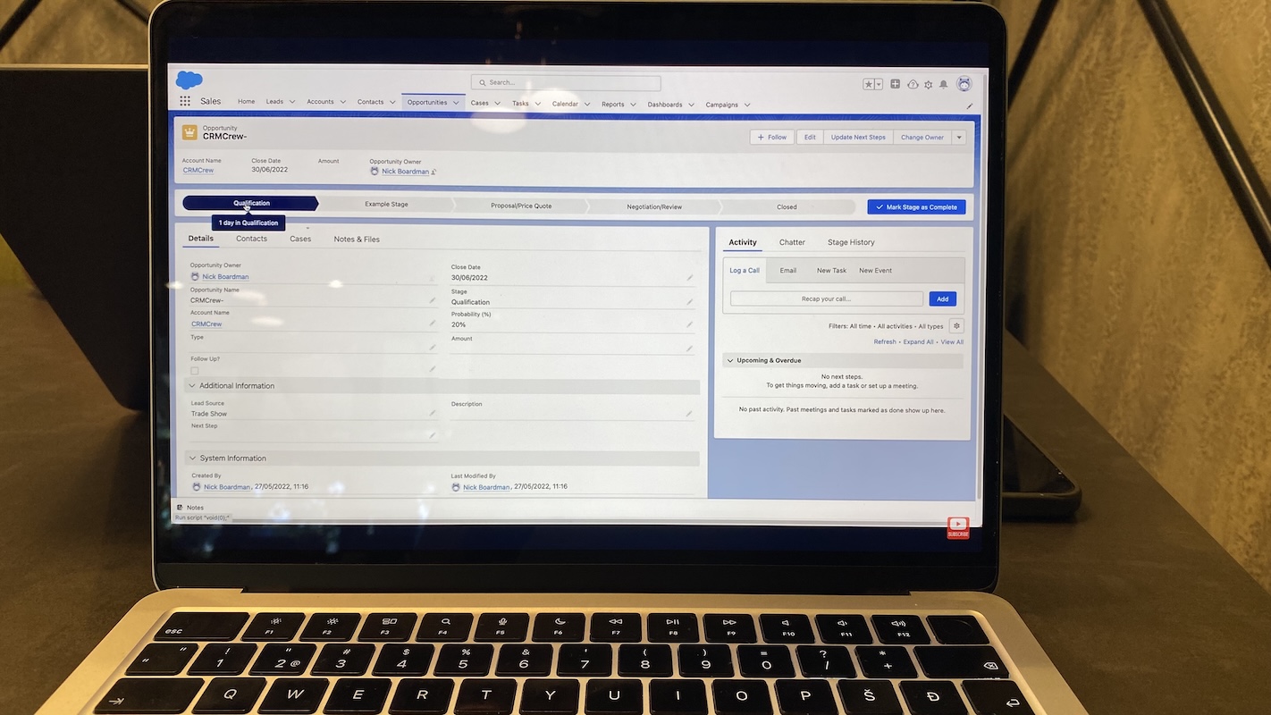 Salesforce CRM opportunity record in qualification stage with details, probability, close date, and activity panel.