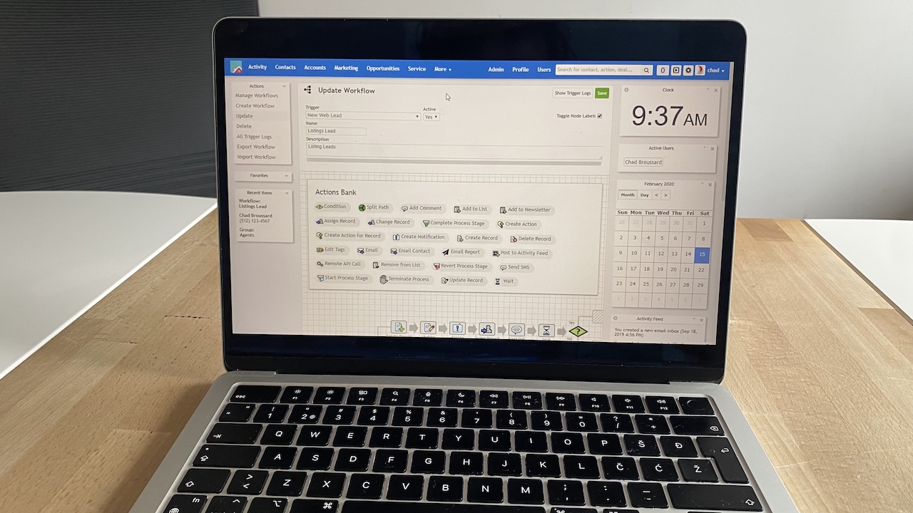 X2CRM open-source CRM displayed on a laptop screen showing the workflow automation builder.