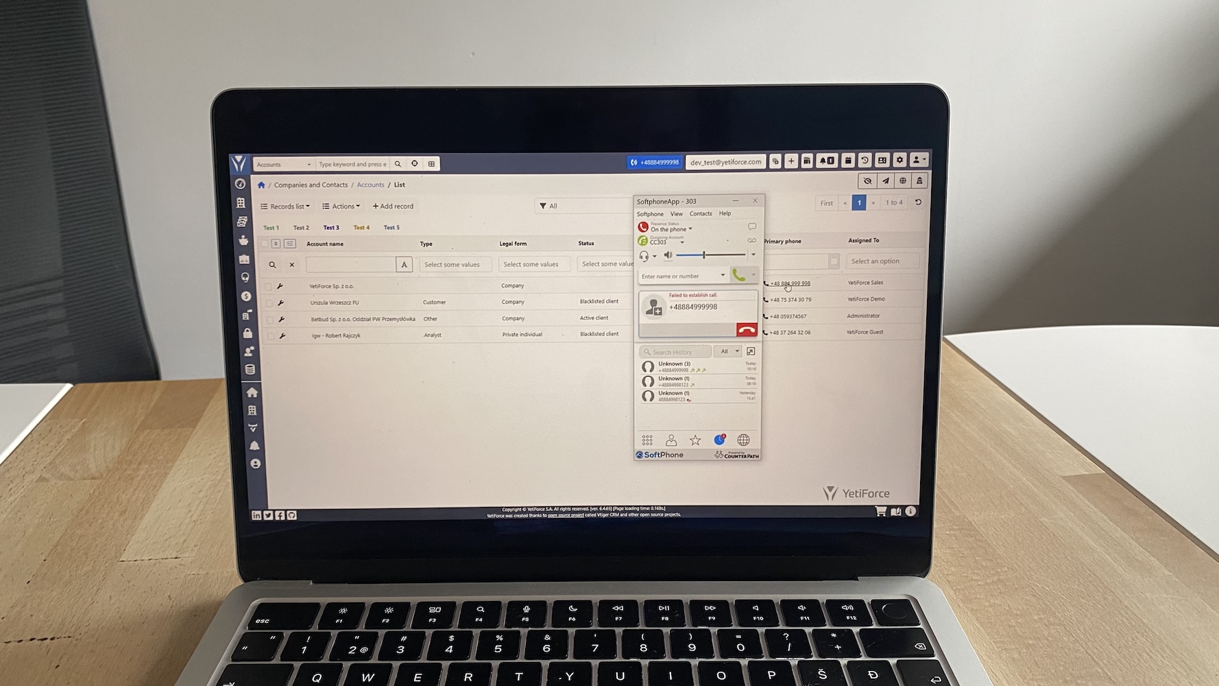 YetiForce open-source CRM interface with accounts list and integrated softphone call panel